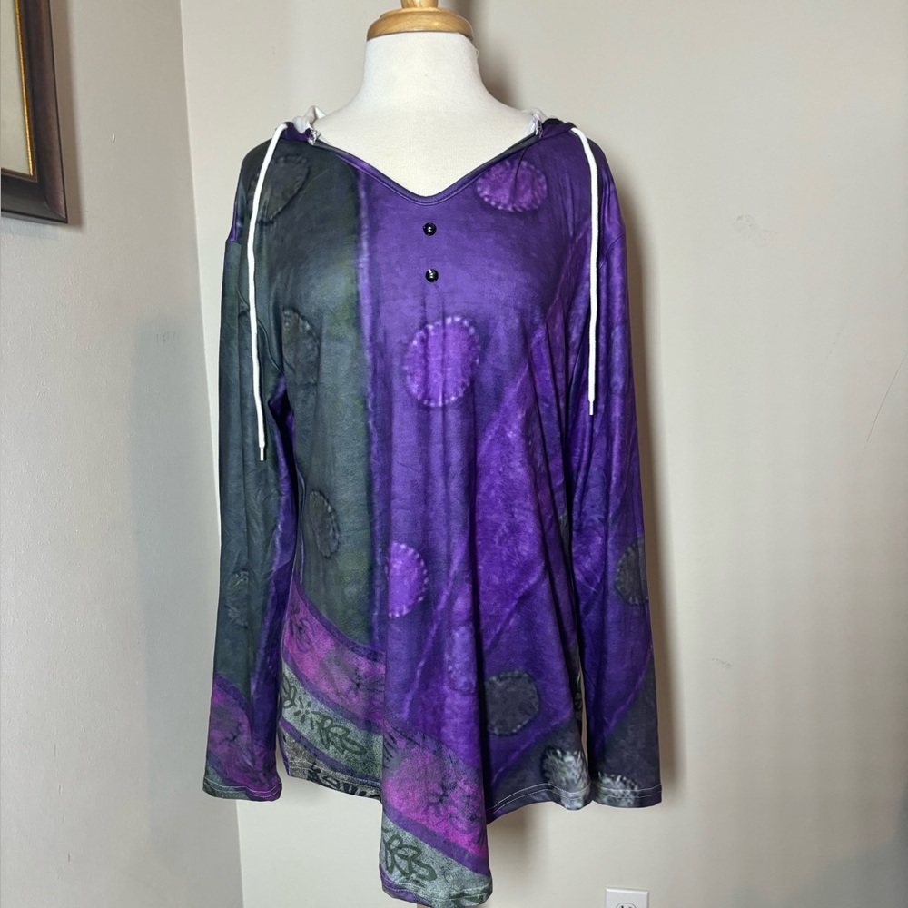 Cute and casual top. Hooded with 
Soft feel. Never worn,